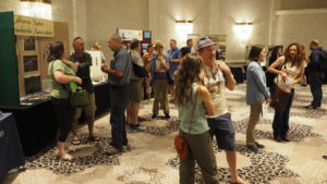 Attendees connect during the poster discussion session. Photo: Drew Kerr